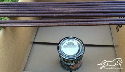 Staining dowels for DIY Horse Show Ribbon Display Hanger